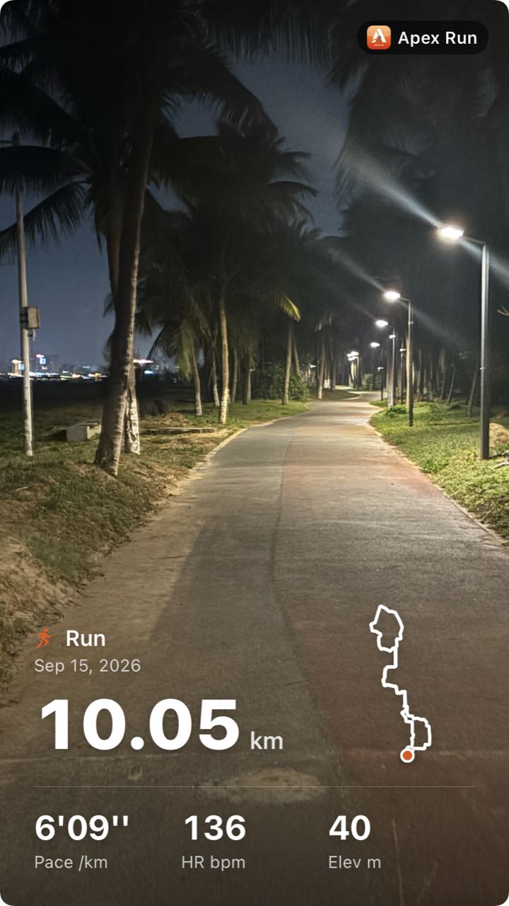 Story-shaped share card on a night photo of a palm-lined path under street lights: the Apex Run mark top right, and at the bottom the run name Run, Sep 15, 2026, 10.05 km in large white type, the route as a white line, and Pace 6'09'' per km, HR 136 bpm, Elev 40 m